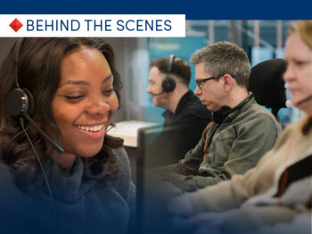 Behind the scenes: smiling call center agents wearing headsets at their desks